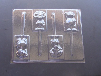 252sp Purple Dinosaur and Friend Chocolate or Hard Candy Lollipop Mold 252sp Purple Dinosaur and Friend Chocolate or Hard Candy Lollipop Mold